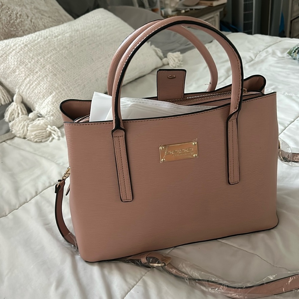 Bebe - Blush pink handbag with dust cover